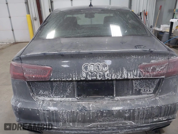 2016 Audi A6 Premium Plus z VIN WAUGFAFCXGN104249, wystawiony jako IAAI lot #41631393 z przebiegiem 117 516 mil mil oraz . Historia ofert i sprzedaży dostępna na DreamBid. Obrazek 16.