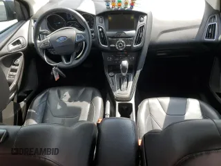 2016 Ford Focus Titanium with VIN 1FADP3N27GL201482, listed as a Copart auction lot 51768335 with 54,463 mi miles and Salvage title. Bid and sale history available at DreamBid. Image 8.