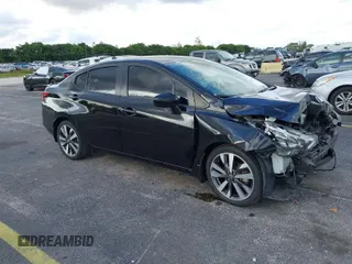 2020 Nissan Versa SR with VIN 3N1CN8FV4LL803825, listed as a IAAI auction lot 41203411 with 74,059 mi miles. Bid and sale history available at carsss.com. Image 1.