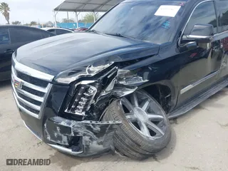 2015 Cadillac Escalade Luxury with VIN 1GYS3MKJ6FR747131, listed as a IAAI auction lot 41820427 with 49,956 mi miles. Bid and sale history available at carsss.com. Image 6.
