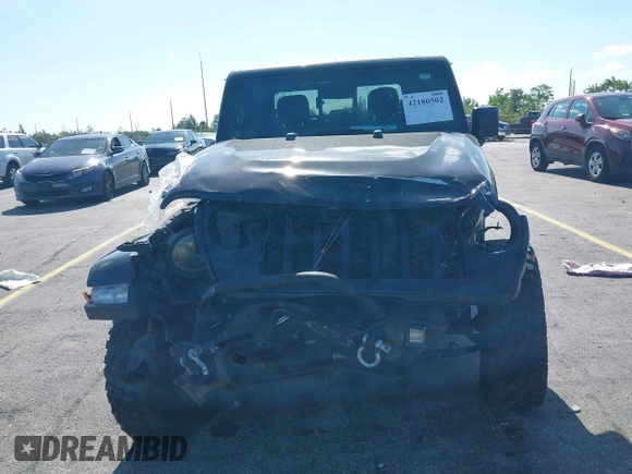 2021 Jeep Gladiator Willys with VIN 1C6HJTAGXML613431, listed as a IAAI auction lot 42180502 with 64,572 mi miles and . Bid and sale history available at DreamBid. Image 12.