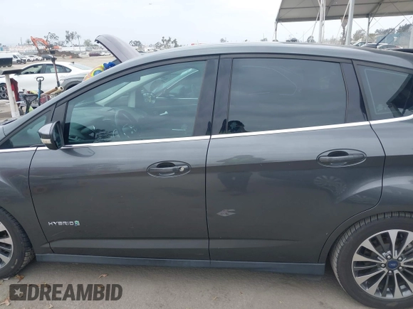 2018 Ford C-Max Titanium with VIN 1FADP5DU4JL105072, listed as a IAAI auction lot 42110522 with 93,176 mi miles and . Bid and sale history available at DreamBid. Image 14.