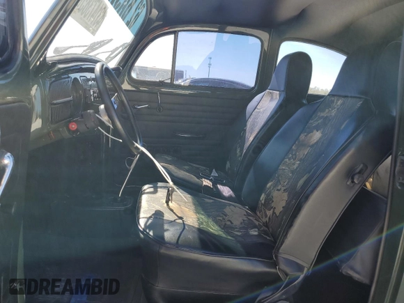 1962 Volkswagen Beetle with VIN 4678770, listed as a Copart auction lot 43147385 with 1,657 mi miles and Non Repairable. Bid and sale history available at DreamBid. Image 7.
