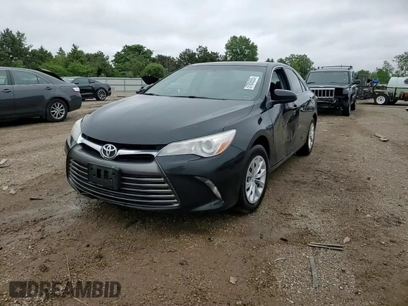 2017 Toyota Camry XLE z VIN 4T1BF1FK5HU780261, wystawiony jako Copart lot #57806555 z przebiegiem 216 536 mil mil oraz Szkoda całkowita • Salvage title. Historia ofert i sprzedaży dostępna na DreamBid. Obrazek 13.