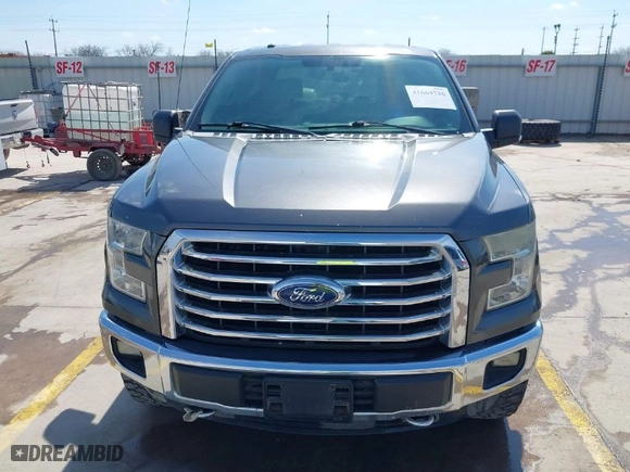 2015 Ford F-150 XLT w/HD Payload Pkg with VIN 1FTFW1EF7FKD04869, listed as a IAAI auction lot 41664736 with 165,784 mi miles. Bid and sale history available at carsss.com. Image 12.