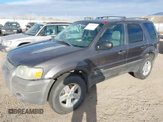 2005 Ford Escape Hybrid with VIN 1FMCU96H45KD29925, listed as a IAAI auction lot 41346475 with 209,922 mi miles. Bid and sale history available at carsss.com. Image 2.