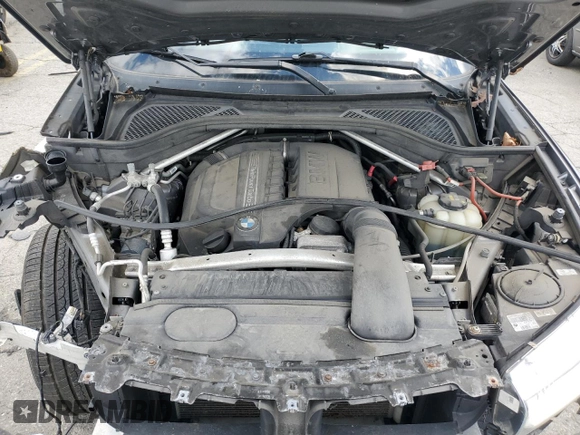2017 BMW X5 xDrive35i z VIN 5UXKR0C34H0X80194, wystawiony jako Copart lot #57305325 z przebiegiem 129 125 mil mil oraz Szkoda całkowita • Salvage title. Historia ofert i sprzedaży dostępna na DreamBid. Obrazek 11.