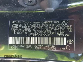 2021 Toyota Corolla Hybrid LE with VIN JTDEAMDE8MJ034218, listed as a IAAI auction lot 41692711 with 65,651 mi miles. Bid and sale history available at carsss.com. Image 9.