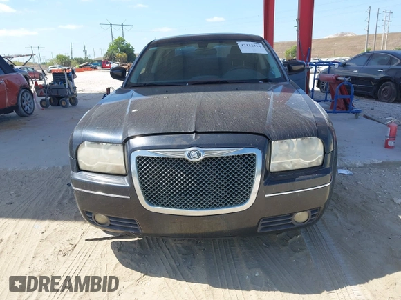 2009 Chrysler 300 Touring with VIN 2C3KA53V59H621936, listed as a IAAI auction lot 42112314 with 198,461 mi miles. Bid and sale history available at carsss.com. Image 6.