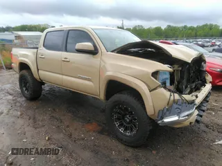 2017 Toyota Tacoma SR5 z VIN 5TFAZ5CN2HX045801, wystawiony jako IAAI lot #41982858 z przebiegiem 86 744 mil mil oraz . Historia ofert i sprzedaży dostępna na DreamBid. Obrazek 1.