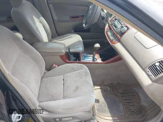 2003 Toyota Camry LE with VIN 4T1BE30K33U243758, listed as a IAAI auction lot 42169032 with 260,336 mi miles and . Bid and sale history available at DreamBid. Image 5.