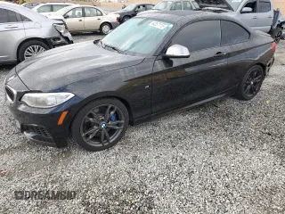 2014 BMW 2 Series M235i with VIN WBA1J7C55EVW84665, listed as a Copart auction lot 44257115 with 111,461 mi miles and Salvage Title. Bid and sale history available at carsss.com. Image 1.