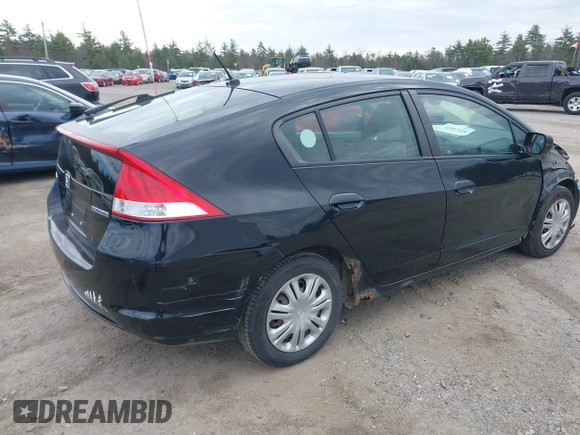 2010 Honda Insight LX with VIN JHMZE2H58AS014396, listed as a IAAI auction lot 42097224 with 167,505 mi miles and . Bid and sale history available at DreamBid. Image 4.