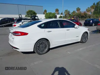 2017 Ford Fusion Hybrid Titanium с VIN 3FA6P0RU3HR323164, выставлен на аукционе IAAI как лот 42303571 с пробегом 119 732 миль миль и . История ставок и продаж доступна на DreamBid. Изображение 4.
