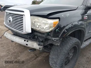 2012 Toyota Tundra 4WD Truck LTD with VIN 5TFHW5F19CX218772, listed as a IAAI auction lot 41472955 with 134,928 mi miles. Bid and sale history available at carsss.com. Image 6.