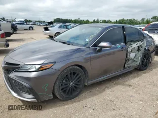 2022 Toyota Camry XSE z VIN 4T1K61AK1NU023697, wystawiony jako Copart lot #56039755 z przebiegiem 76 979 mil mil oraz Szkoda całkowita • Salvage title. Historia ofert i sprzedaży dostępna na DreamBid. Obrazek 1.