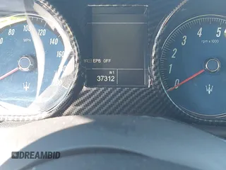 2013 Maserati GranTurismo Convertible Sport with VIN ZAM45MMA2D0069786, listed as a IAAI auction lot 40874830 with 37,312 mi miles. Bid and sale history available at carsss.com. Image 7.