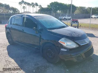 2008 Nissan Versa 1.8 S with VIN 3N1BC13E98L447523, listed as a IAAI auction lot 41889841 with 111,137 mi miles. Bid and sale history available at carsss.com. Image 1.