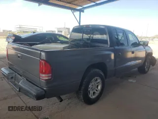 2001 Dodge Dakota Sport z VIN 1B7HL2AN21S298590, wystawiony jako Copart lot #54430385 z przebiegiem 175 365 mil mil oraz Szkoda całkowita • Salvage title. Historia ofert i sprzedaży dostępna na DreamBid. Obrazek 3.