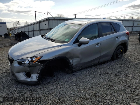2014 Mazda CX-5 Touring with VIN JM3KE4CY4E0427294, listed as a Copart auction lot 51372155 with 121,324 mi miles and Salvage Title. Bid and sale history available at carsss.com. Image 1.