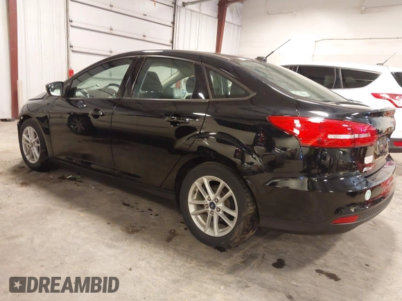 2018 Ford Focus SE with VIN 1FADP3F23JL215479, listed as a IAAI auction lot 41936036 with 96,560 mi miles. Bid and sale history available at carsss.com. Image 3.