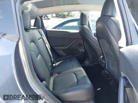 2020 Tesla Model Y Long Range with VIN 5YJYGDEF8LF000658, listed as a IAAI auction lot 41669246 with 44,281 mi miles and . Bid and sale history available at DreamBid. Image 8.