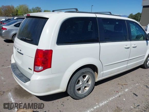 2012 Dodge Grand Caravan SXT with VIN 2C4RDGCGXCR365194, listed as a IAAI auction lot 42058530 with 131,059 mi miles and . Bid and sale history available at DreamBid. Image 4.