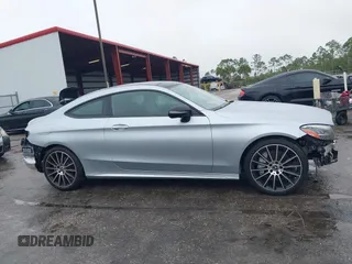 2022 Mercedes-Benz C 300 with VIN W1KWJ8DB7NG115264, listed as a IAAI auction lot 41353889 with 24,361 mi miles and . Bid and sale history available at DreamBid. Image 14.