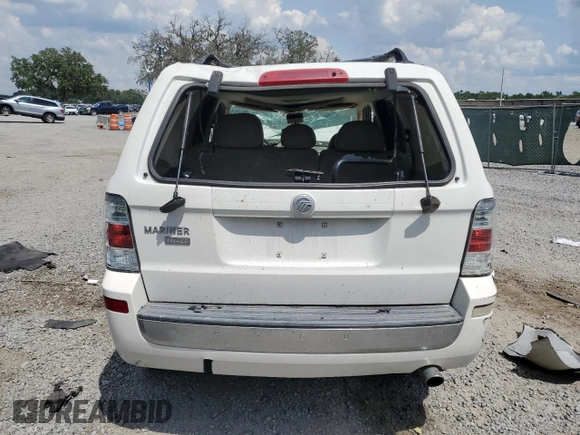2009 Mercury Mariner Premier с VIN 4M2CU87709KJ14823, выставлен на аукционе Copart как лот 60121965 с пробегом Не указан миль и Списание • Salvage title. История ставок и продаж доступна на DreamBid. Изображение 6.