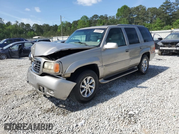 1999 Cadillac Escalade z VIN 1GYEK13RXXR408201, wystawiony jako Copart lot #53805845 z przebiegiem 268 205 mil mil oraz Szkoda całkowita • Salvage title. Historia ofert i sprzedaży dostępna na DreamBid. Obrazek 1.