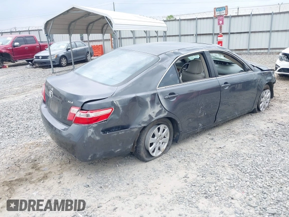 2009 Toyota Camry LE z VIN 4T1BK46KX9U594987, wystawiony jako IAAI lot #42039029 z przebiegiem 156 812 mil mil oraz . Historia ofert i sprzedaży dostępna na DreamBid. Obrazek 4.