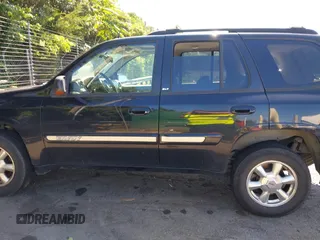 2005 GMC Envoy SLE with VIN 1GKDS13S452208252, listed as a IAAI auction lot 42357457 with 197,419 mi miles and . Bid and sale history available at DreamBid. Image 14.