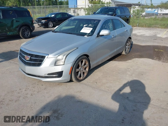 2015 Cadillac ATS Luxury RWD z VIN 1G6AB5RA6F0127029, wystawiony jako IAAI lot #42376359 z przebiegiem 131 823 mil mil oraz . Historia ofert i sprzedaży dostępna na DreamBid. Obrazek 2.