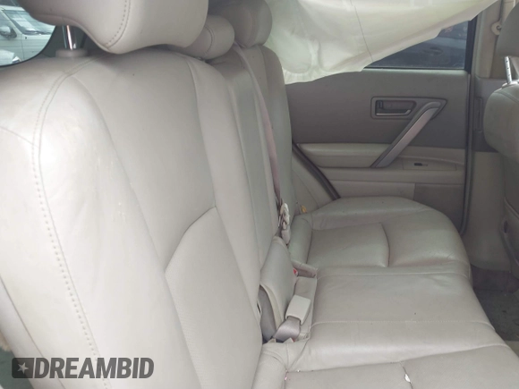 2004 Infiniti FX35 with VIN JNRAS08U54X105281, listed as a IAAI auction lot 41785353 with 121,231 mi miles. Bid and sale history available at carsss.com. Image 8.