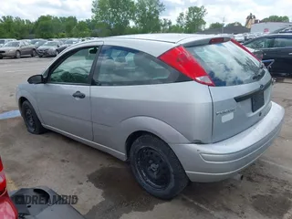 2007 Ford Focus S with VIN 1FAFP31N97W218727, listed as a IAAI auction lot 42183392 with 135,456 mi miles and . Bid and sale history available at carsss.com. Image 3.