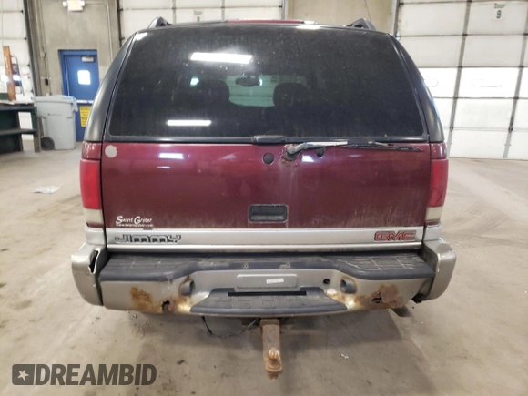 2001 GMC Jimmy SLT z VIN 1GKDT13W112191002, wystawiony jako Copart lot #55150035 z przebiegiem 203 940 mil mil oraz Nie do naprawy • Non repairable. Historia ofert i sprzedaży dostępna na DreamBid. Obrazek 6.
