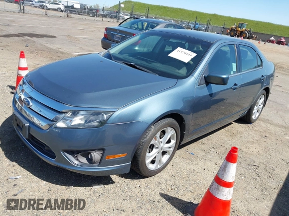 2012 Ford Fusion SE z VIN 3FAHP0HG9CR138274, wystawiony jako IAAI lot #41970444 z przebiegiem 105 707 mil mil oraz . Historia ofert i sprzedaży dostępna na DreamBid. Obrazek 2.