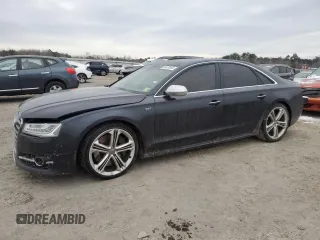2015 Audi S8 z VIN WAUK2AFD2FN021685, wystawiony jako Copart lot #88078355 z przebiegiem Nie podano mil oraz Szkody całkowita. Historia ofert i sprzedaży dostępna na DreamBid. Obrazek 1.
