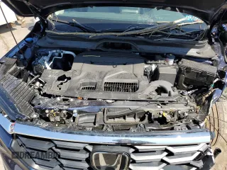 2025 Honda Pilot EX-L with VIN 5FNYG1H47SB039006, listed as a Copart auction lot 52560115 with 10,870 mi miles and Salvage Title. Bid and sale history available at carsss.com. Image 12.