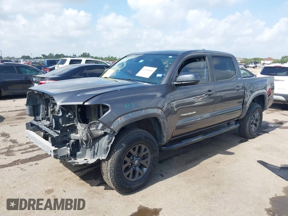 2021 Toyota Tacoma SR with VIN 3TYAX5GNXMT012484, listed as a IAAI auction lot 42429068 with 105,555 mi miles and . Bid and sale history available at DreamBid. Image 17.