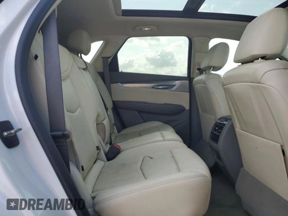2021 Cadillac XT5 FWD Premium Luxury z VIN 1GYKNCR48MZ136597, wystawiony jako Copart lot #79694104 z przebiegiem 52 504 mil mil oraz Szkoda całkowita • Salvage title. Historia ofert i sprzedaży dostępna na DreamBid. Obrazek 11.