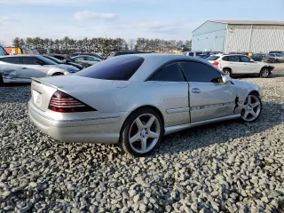 2003 Mercedes-Benz CL-Class 5.0L with VIN WDBPJ75J63A035886, listed as a Copart auction lot 87163504 with 67,919 mi miles and Salvage Title. Bid and sale history available at carsss.com. Image 3.