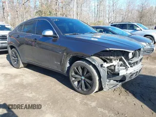 2019 BMW X6 xDrive35i with VIN 5UXKU2C51K0Z64589, listed as a IAAI auction lot 41537380 with 60,769 mi miles. Bid and sale history available at carsss.com. Image 1.