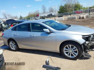 2018 Chevrolet Malibu LT with VIN 1G1ZD5ST8JF140336, listed as a IAAI auction lot 41972587 with 318,514 mi miles and . Bid and sale history available at DreamBid. Image 14.