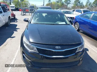 2016 Kia Optima LX with VIN 5XXGT4L3XGG013835, listed as a IAAI auction lot 41815349 with 120,628 mi miles and . Bid and sale history available at carsss.com. Image 12.