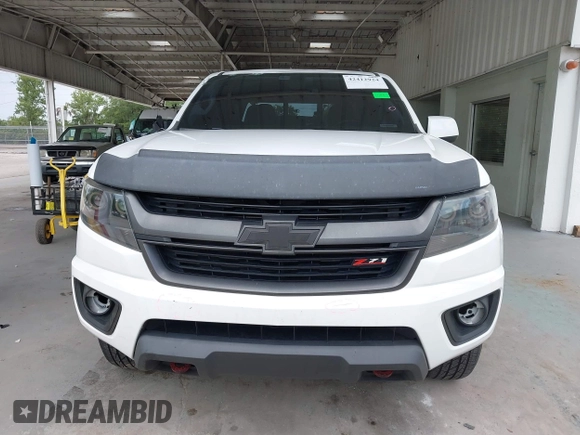 2020 Chevrolet Colorado 2WD Z71 with VIN 1GCGSDEN2L1159458, listed as a IAAI auction lot 42412924 with 90,011 mi miles and . Bid and sale history available at DreamBid. Image 13.