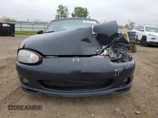 1999 Mazda MX-5 Miata with VIN JM1NB3531X0102616, listed as a Copart auction lot 59779415 with 194,494 mi miles and Salvage title. Bid and sale history available at DreamBid. Image 5.