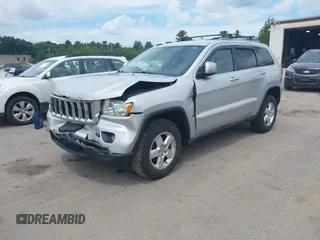 2011 Jeep Grand Cherokee Laredo with VIN 1J4RR4GG3BC734683, listed as a IAAI auction lot 42656716 with 151,220 mi miles and . Bid and sale history available at DreamBid. Image 2.