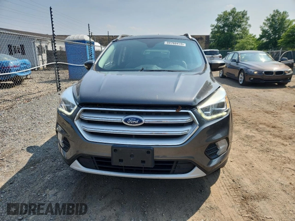 2018 Ford Escape Titanium with VIN 1FMCU9J90JUA15154, listed as a Copart auction lot 59768415 with 93,810 mi miles and Salvage title. Bid and sale history available at DreamBid. Image 5.