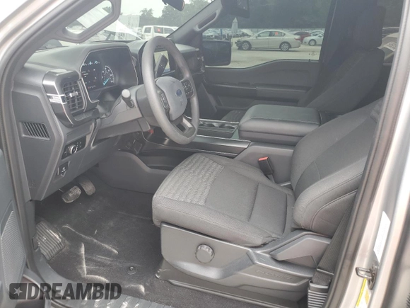 2023 Ford F-150 XL с VIN 1FTEW1EPXPKF94031, выставлен на аукционе Copart как лот 58540575 с пробегом 25 257 миль миль и Списание • Salvage title. История ставок и продаж доступна на DreamBid. Изображение 7.